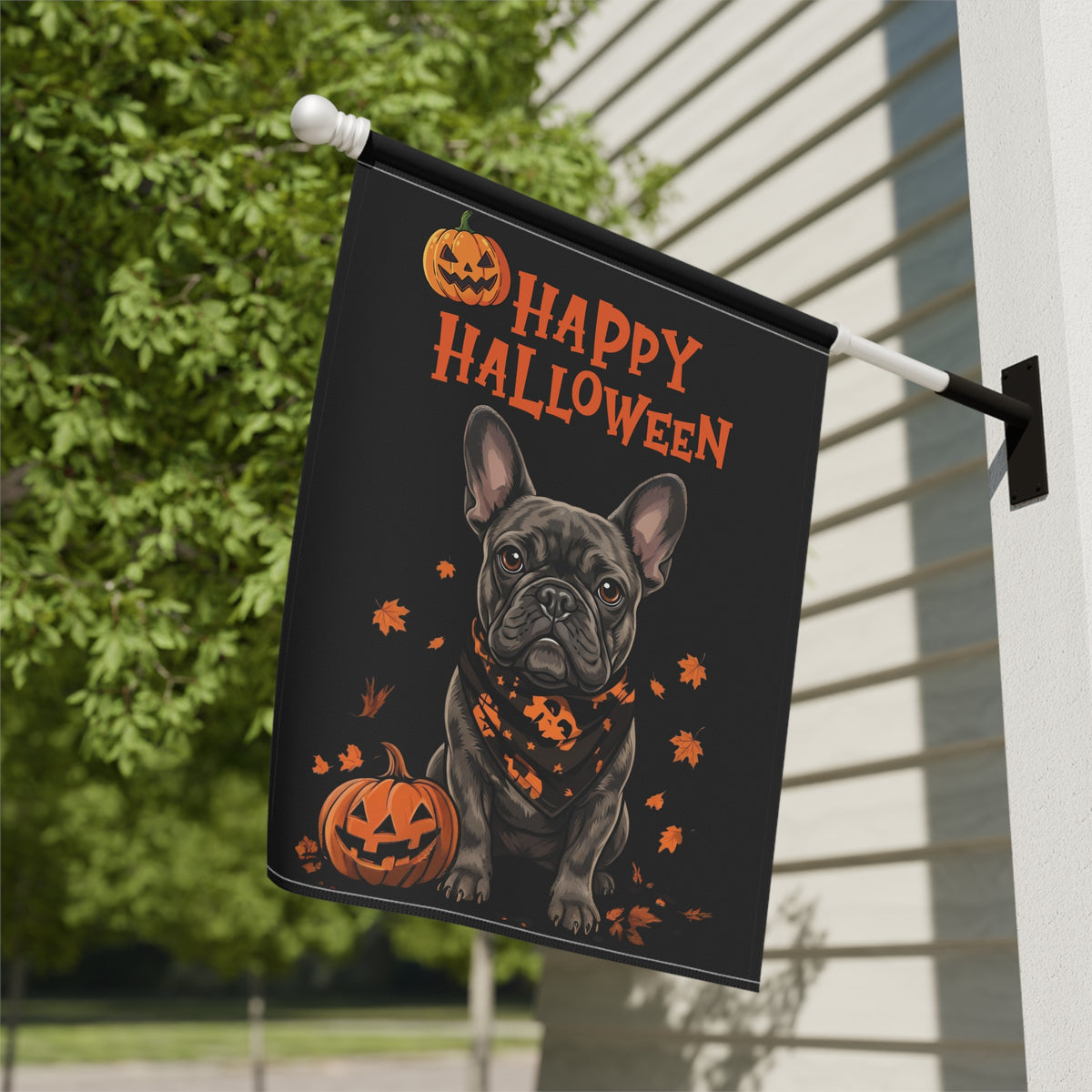 Little Pumpkin French Bulldog Halloween garden flag mounted on a white flagpole attached to the side of a house