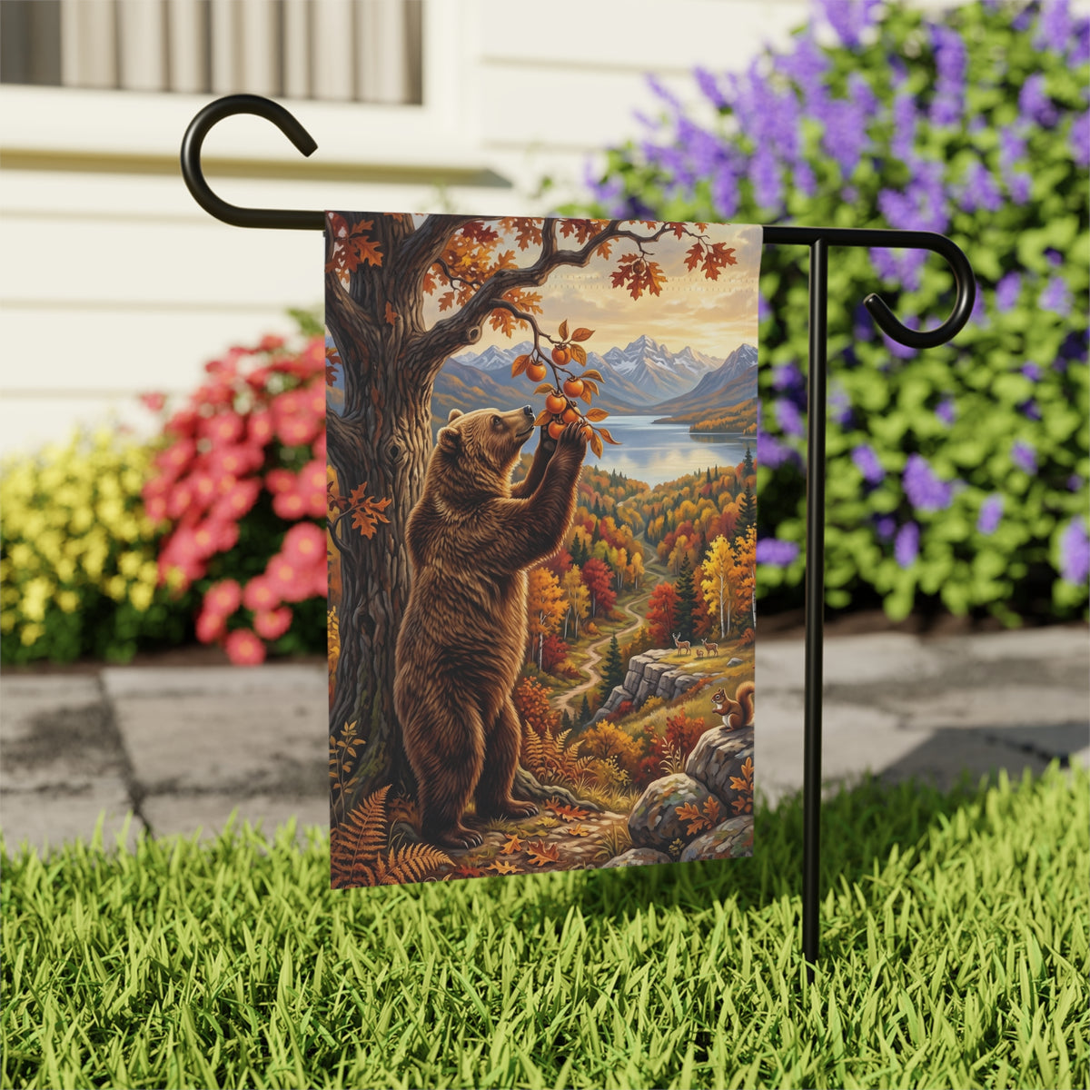 Fruit Tree And Bear house flag mounted on a wall bracket at an angle against a house exterior