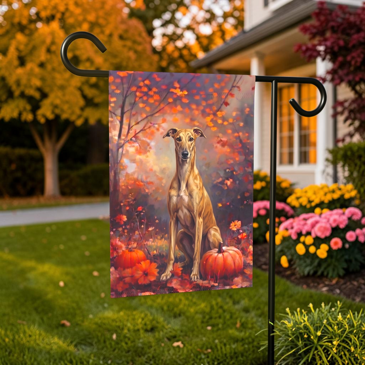 Fall Greyhound With Pumpkins on a garden flag stand in front of a house with autumn landscaping