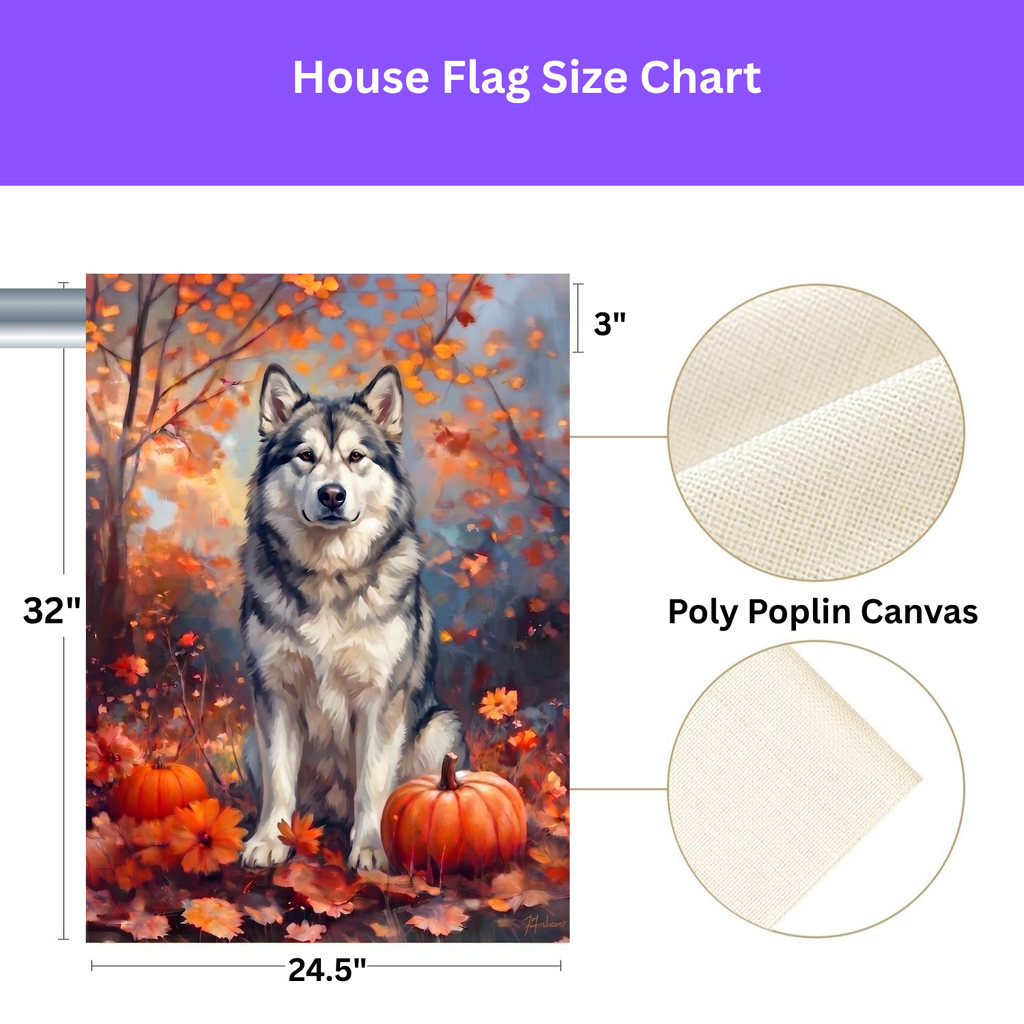 Fall Alaskan Malamute With Pumpkins on a garden flag stand in a garden bed with fall flowers