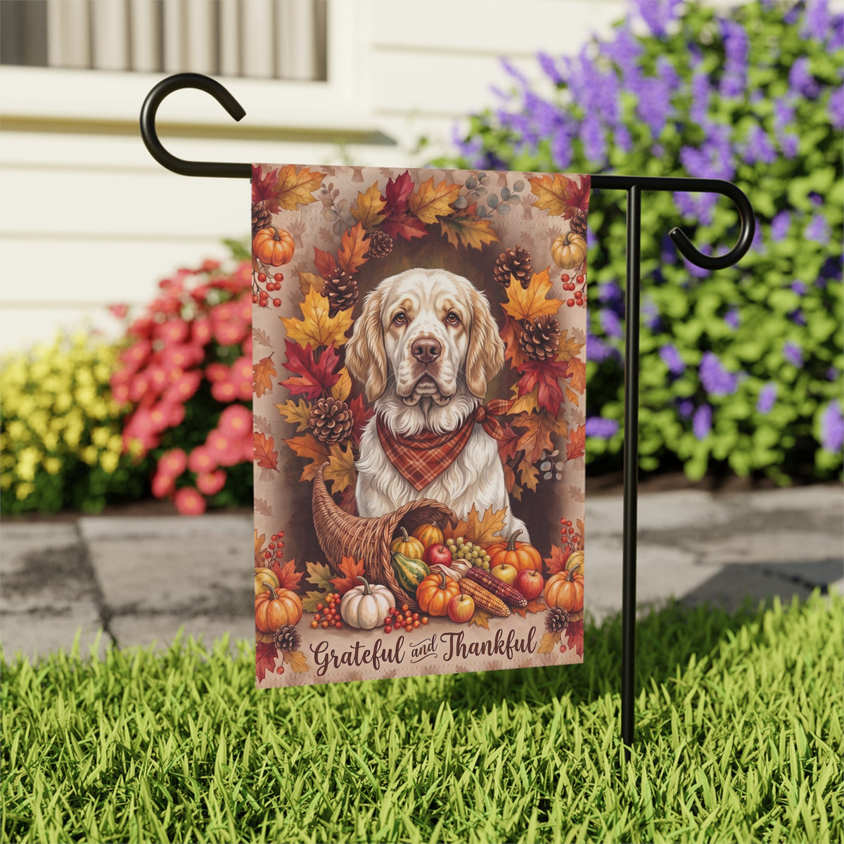Grateful and Thankful Clumber Spaniel house flag mounted on a wall bracket at a diagonal angle against a house exterior