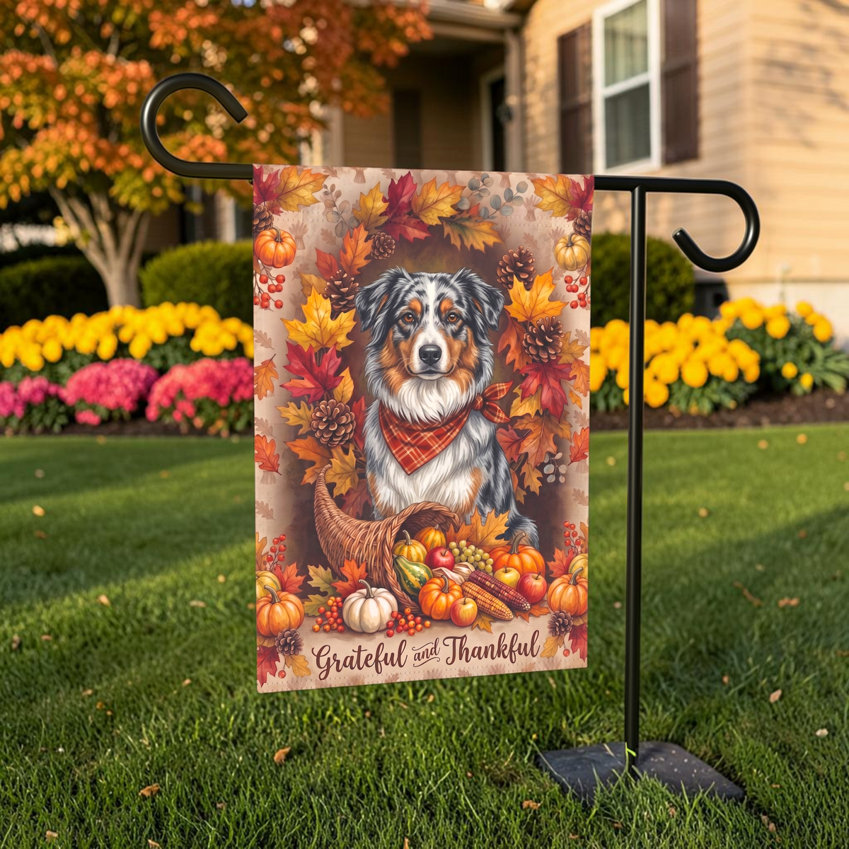 Grateful and Thankful Australian Shepherd Garden Flag garden flag on a stand in front of a house with shutters and a door wreath