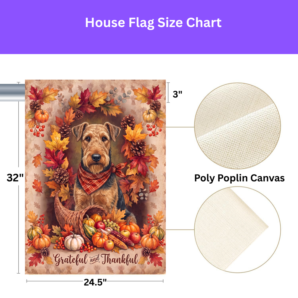 Grateful And Thankful Airedale Terrier garden flag on a stand in a garden bed with orange marigolds and purple flowers