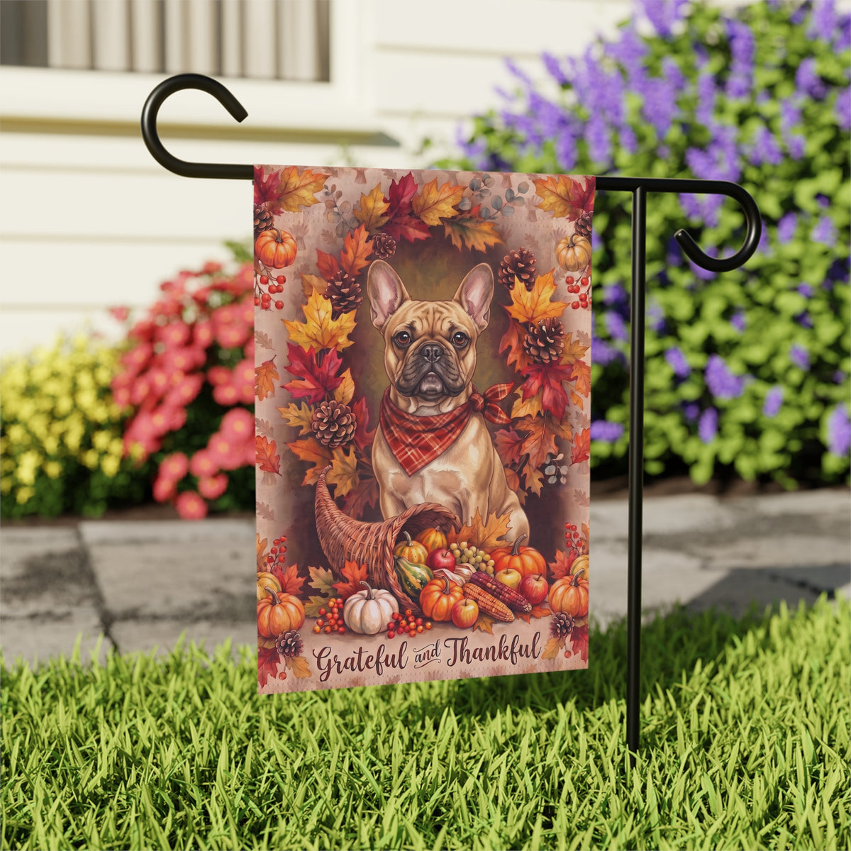 Grateful and Thankful French Bulldog house flag mounted on a wall bracket at a diagonal angle against a house exterior