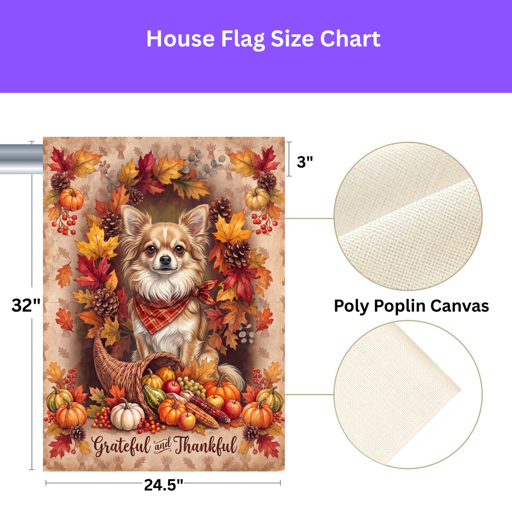 Grateful and Thankful Long Hair Chihuahua garden flag on a stand in a garden bed with orange marigolds and purple flowers