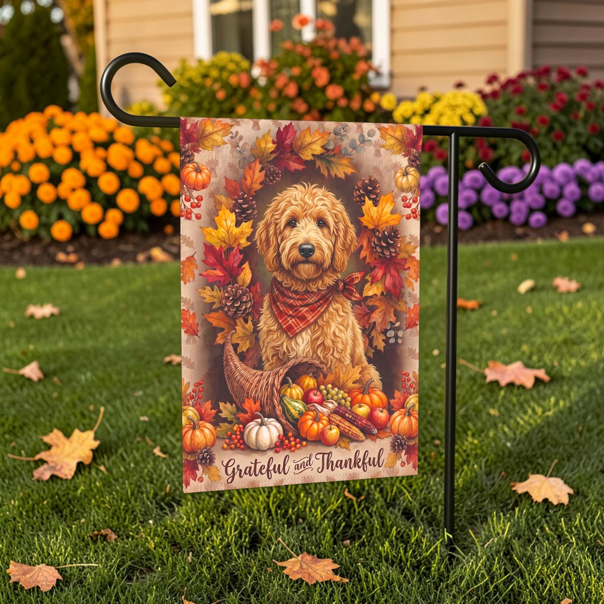 Grateful and Thankful Doodle Golden Noodle garden flag on a stand in front of a house with shutters and a door wreath
